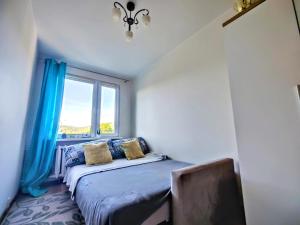 Postel nebo postele na pokoji v ubytování Apartament Panorama