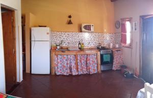 Una cocina o kitchenette en Cabañas Monika - Alta