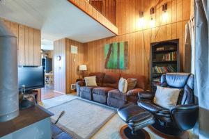 a living room with a couch and a tv at Strawberry Townhouse Walk to Leland Snowplay! in Strawberry