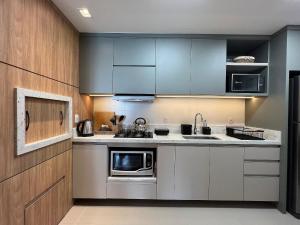 A cozinha ou cozinha compacta de Reserva das Orquídeas 304B - Borges Centro Gramado
