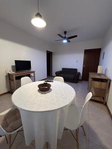 a living room with a white table and chairs at Consorcio San Ignacio in San Juan