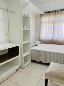 Ένα ή περισσότερα κρεβάτια σε δωμάτιο στο Casa da vó Nãna