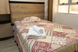 Ένα ή περισσότερα κρεβάτια σε δωμάτιο στο GRAN CARAMOLLE