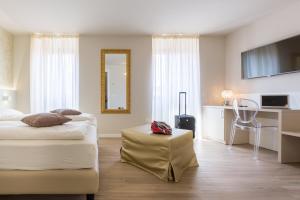 Llit o llits en una habitació de Pace 1954 Hotel