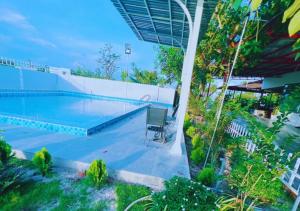 Bazén v ubytování Homestay Nguyễn Hưng nebo v jeho okolí