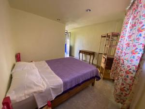 Postel nebo postele na pokoji v ubytování Casa Meraki