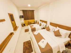 מיטה או מיטות בחדר ב-The Mount View Single Tree Hotel