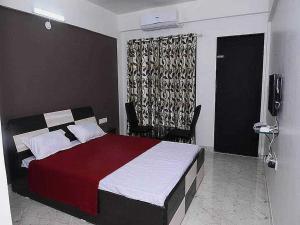 Krevet ili kreveti u jedinici u okviru objekta Flagship Sanvi Resort
