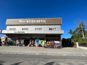 a melia hotel with a lot of merchandise in front of it at Meida Hotel in Nuku‘alofa
