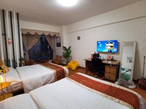 Легло или легла в стая в Wuhan Downtown Apartment - Hankou Core Deluxe Suite for 4 People