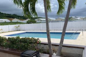 Piscina de la sau aproape de Welcome to our Ocean View Villa!
