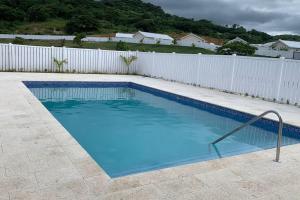 Piscina de la sau aproape de Welcome to our Ocean View Villa!