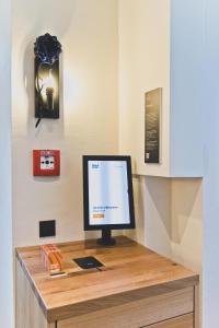 TV o dispositivi per l'intrattenimento presso HOTEL BLAUE ROSE -digital check in-