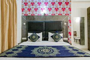 Postel nebo postele na pokoji v ubytování Hotel HSP Suites At Delhi Airport