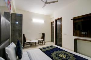 Postel nebo postele na pokoji v ubytování Hotel HSP Suites At Delhi Airport