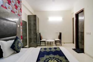 Postel nebo postele na pokoji v ubytování Hotel HSP Suites At Delhi Airport