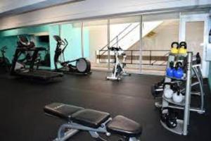 a gym with treadmills and machines in a room at Maui El Dorado Kaanapali Beach Studio- G204 in Kahana