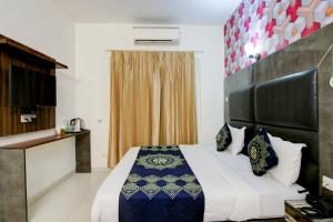 Postel nebo postele na pokoji v ubytování Hotel HSP Suites At Delhi Airport