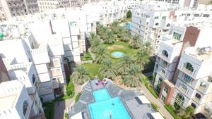 Bazén v ubytování Muscat Oasis Residences nebo v jeho okolí