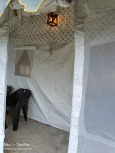 Postel nebo postele na pokoji v ubytování Saanidhya Camps