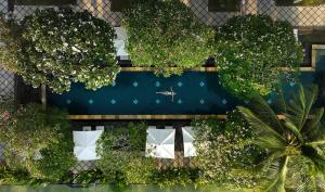 an overhead view of a fence with trees and plants at Nusa Dua Beach Hotel & Spa, Bali in Nusa Dua