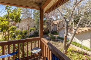 a balcony with a view of a yard at Harbour Oaks 606 in Saint Simons Island