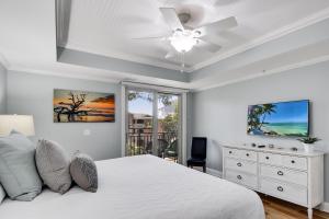 Ένα ή περισσότερα κρεβάτια σε δωμάτιο στο 760 Ocean Blvd. #203 +18 φωτογραφίες