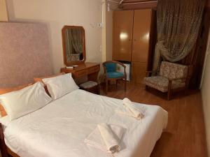 Giường trong phòng chung tại Epoca