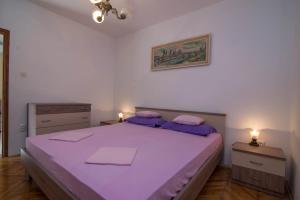 Postel nebo postele na pokoji v ubytování Sandra A2+1***