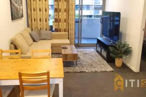 Istumisnurk majutusasutuses Delight in Dickson -2bd 2bth 2Csp Apt