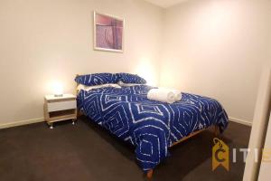 Voodi või voodid majutusasutuse Delight in Dickson -2bd 2bth 2Csp Apt toas +14 fotot