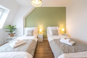 Ένα ή περισσότερα κρεβάτια σε δωμάτιο στο BENVILLE Freital - Nespresso Kaffee - Windbergblick - Zentral