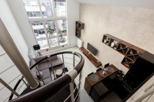 a view of a living room from the top of a building at Janki Bryla Two-Level Apartment in Gdynia