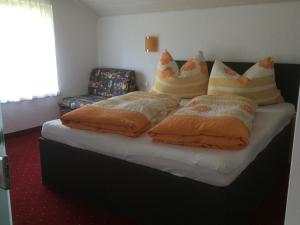 Postel nebo postele na pokoji v ubytování Haus Sonnenhang