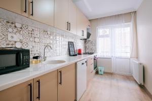 مطبخ أو مطبخ صغير في Cozy Flat with Balcony in Bursa