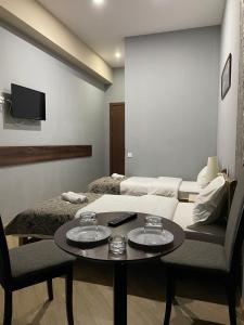 TV a/nebo společenská místnost v ubytování New Hotel