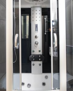 a mirror in a room with a shower at HOTEL ALBES in Prizren +17 photos