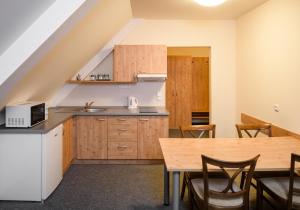 Kuchyňa alebo kuchynka v ubytovaní Horský Hotel Skiland