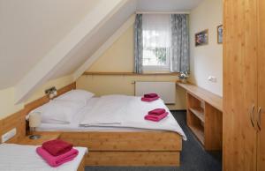 Posteľ alebo postele v izbe v ubytovaní Horský Hotel Skiland