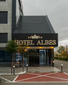 a hotel alliance sign in front of a building at HOTEL ALBES in Prizren
