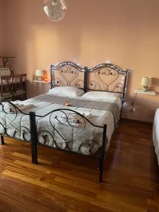 A bed or beds in a room at Casa Di Marzio