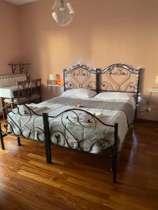 A bed or beds in a room at Casa Di Marzio