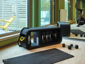 Fitness centrum a/nebo fitness zařízení v ubytování TRIBE Baden-Baden