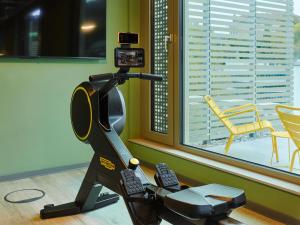 Fitness centrum a/nebo fitness zařízení v ubytování TRIBE Baden-Baden