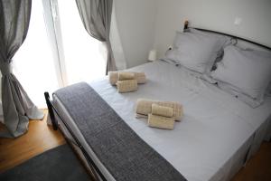 Postel nebo postele na pokoji v ubytování Lefkada Beach Villa