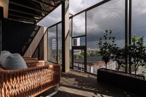 Posezení v ubytování Impiana by Roxy Hotel
