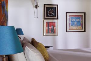 Postel nebo postele na pokoji v ubytování BluSalzz Villa - Muhamma, Alleppey - Kerala