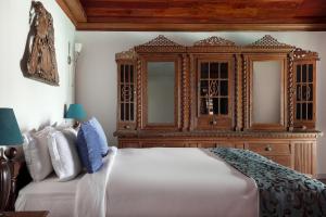 Postel nebo postele na pokoji v ubytování BluSalzz Villa - Muhamma, Alleppey - Kerala