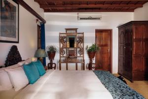 Postel nebo postele na pokoji v ubytování BluSalzz Villa - Muhamma, Alleppey - Kerala