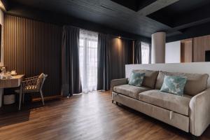 Posezení v ubytování Impiana by Roxy Hotel